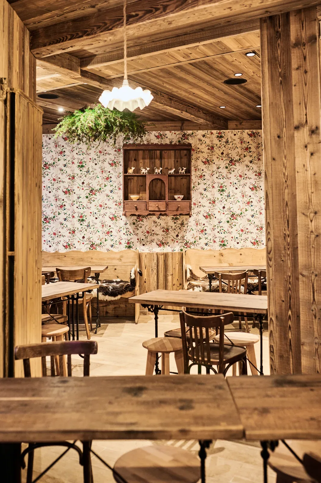 The bakery room and its floral wallpaper